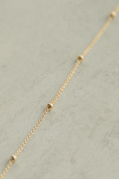 The Gilded Orb Necklace
